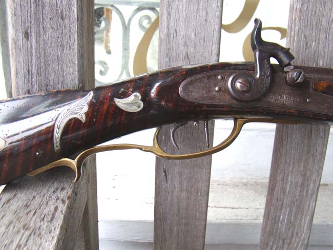 A fine silver inlaid curly maple Pennsylvania percussion long rifle by Joseph Douglass of Huntington county circa 1850-1860. — image 4